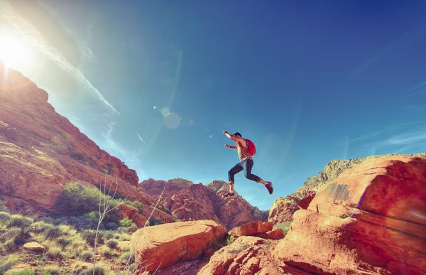 mountain, jumping, rocks, sun